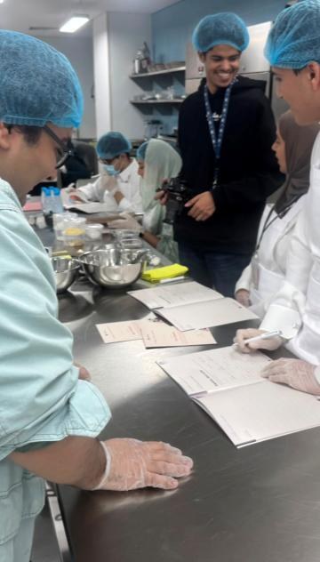 Camp participants in a cooking workshop